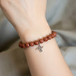 Pulsera Goldstone con Charm Colibrí